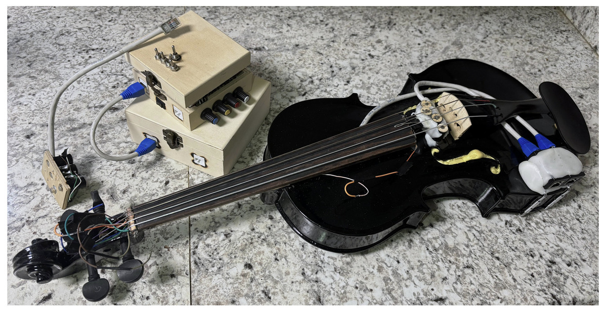 The EV: An Iterative Journey in Digital-Acoustic String Instrument Augmentation